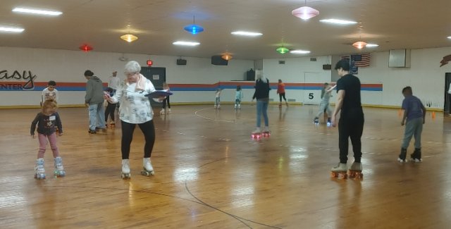 Miss Kathy working with our skaters of all levels!